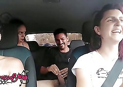 Horny couple is fucking in the back of a car while their friends are in front