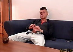 Twink fiddles with foreskin and jerks cock