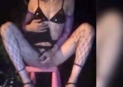 A banging transvestite in a low-level mini-petticoat, torn purple tights, high stiletto heels, on the edge of the Nationale 7 in BRUNOy. two:00 a.m. [