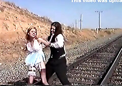 Ticklish Damsel Tickled on Railroad Tracks (nylon bare feet tickling)