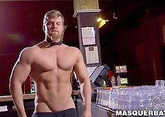 Buff stud strips nude to masturbate passionately behind bar