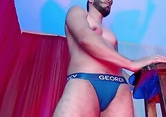 Beefy jock shows off his sexy moves and big booty in a gay erotic dance