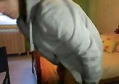 Cute boy spreads his cheeks