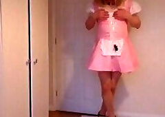 Pink costume, nude pantyhose and heels