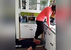Amateur Housewife Slapping Her Mans Face With Her Feet In The Kitchen