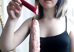 Amateur femdom vixen indulging her fetish for hot wax play