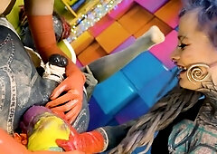 Two latex dominatrix sissy femdom anal fisting