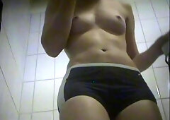 Hairy pussy and small tits filmed in the dressing room