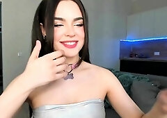 Busty curly brunette with big boobs fucks on couch