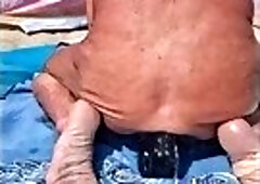 Beach fun stretching my hole with my huge black dildo