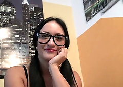 Nerdy girl in plaid skirt and glasses pleasures herself with a purple anal toy before her partner arrives for creampie