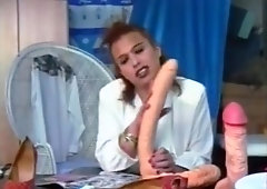 Lustful Tgirl plays with huge dildos