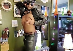 Kennie Jai in leather gives himself a good milking for you