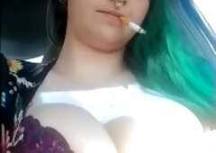 Exhibitionist masturbates in public parking lot with cigarette dangling