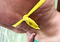 Anal creampie on a public beach