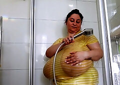 Busty curly brunette with big boobs fucks on couch