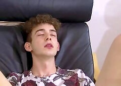 Curly slender guy with big balls jerks off his massive cock