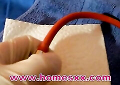 a beauty gets her bowel cleaned with anal enema balls enema syringe and big enemas with a ballon enema tube and farting on the water closet