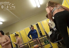 MILF with appetizing ass undressing in the women's locker room