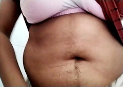 Shaved Asian-European beauty explores her wet pussy in front of the bathroom mirror