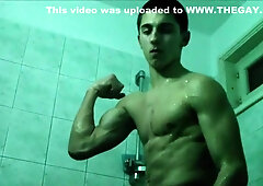 Young Teenboy Flexes Muscles In Store Changing Room Shower
