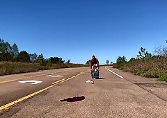 Unclothing nude on a public road and fapping off before getting clad again.