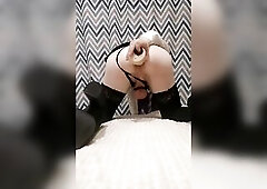 Sissy femboy training her booty in chastity cage