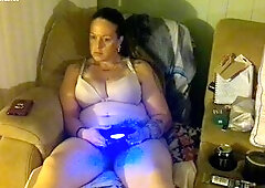 Step Mommy smokin' and playing movie scene games in her brassiere and pants