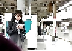 Japanese babe shows upskirt action where she rubs her pussy