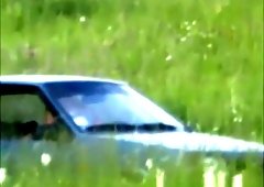 Horny couple caught fucking inside car