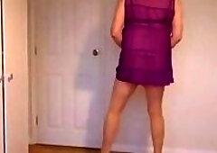 Blonde in nude pantyhose, black high heels and no knickers