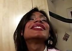 Tanned black shemale gets her cock sucked by white dude