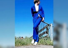 Clothed up in a costume flashing outdoor and peeing on the street