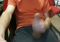 Dressed guy wanks on cam