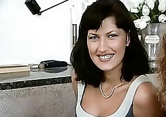 Lascivious darksome-haired German chick and naughty mother I'd like to fuck are sucking large wang and getting their faces sprayed with a large l