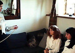 Adorable brunette spanked hard in lesbian BDSM threesome