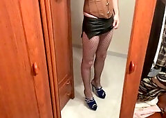 T-girl in tights and sexy uniform