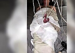 Goode Angel wraps hubby like a mummy and ropes his ramrod and balls to the ceiling with weights and floggs,kicks,stomps and sexy waxes his penis and b
