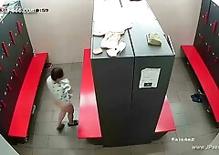 Hidden camera captures three Chinese women changing in a locker room
