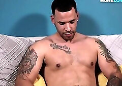 Buzzcut inked stud strips shorts and masturbates indoor