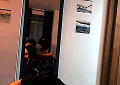 Ebony suit, warm light, and an unforgettable fellatio session