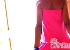 Cute Carla does a striptease for the camera