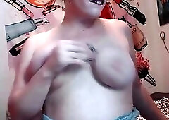 Chubby shemale with big tits vigorously tugs on her boner