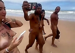 Friends go to the nude beach to give it to the hot guys.