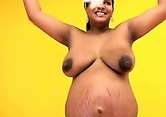 I Love Preggos: pregnant ebony mom with big natural tits