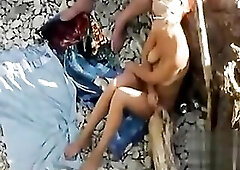 Pervy voyeur filmed a swingers copulating behind a log at a shingle beach during the time that likewise being watched by a stud who was stroking off t