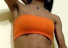 Ladyboy in orange stockings sucks and jerks massive cock