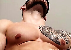 Inked bald hunk David Boss teasing his throbbing cock solo