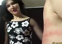 Brunette Mistress Whipping Guy