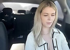 Sexy Blonde in Cleavage-Baring Outfit Teases in Car